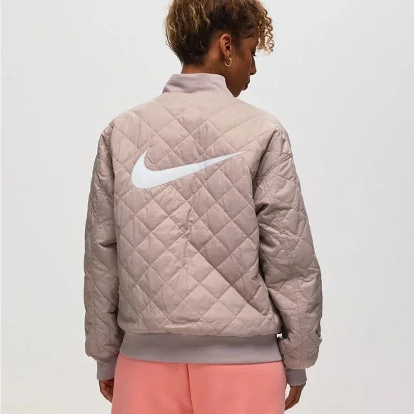 NIKE WOMEN’S REVERSIBLE VARSITY BOMBER JACKET - Picture 6 of 10